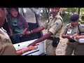 Download Tibetan women being taken into police custody MP3 song and Music Video