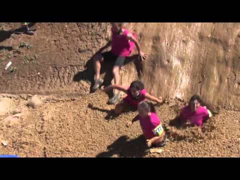 DelawareonlineTV - Delaware Mud Run participants slide into an ice-filled pit during the fourth running of the event, which benefits the Leukemia Research Foundation of Delaware.