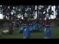 Rwandan women dancing with baskets on their heads