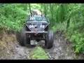 Walker climing Tub Rock at GrayRock offroad. Cab Truck on swampers
