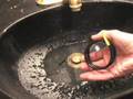 How to unblock clogged-up sinks of hair caught in drain pipe