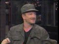 Bono and Larry Mullen talking about the album Pop, touring with a giant lemon, Bono getting kicked out of the band, their friendship with Frank Sinatra and how rock has become so boring.
