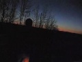 video 5 - 16 mar 2005. *frail common animal* ...rte 2 somewhere in ny. return trip from previous clip. dark sunset makes little light. parking lamps glow. oncoming car scares me away.