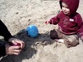Grayson smashing sand castles