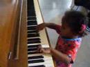 Lucy playing piano 5/13/08