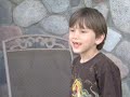 Boy found talking to bird.