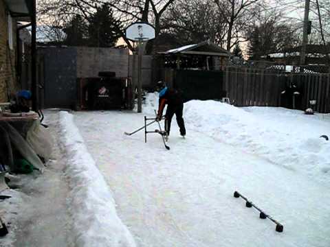 Hockey . Dennis Gol is practicing stickhandling drills.