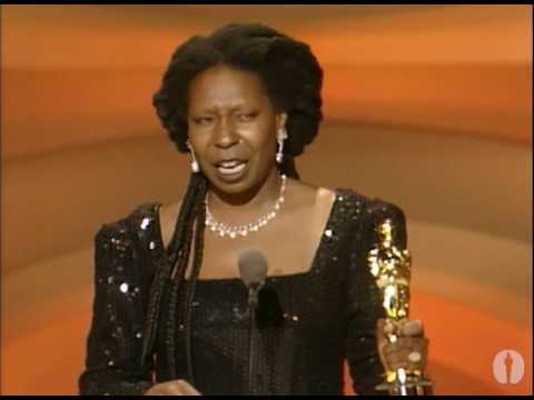 whoopi - Denzel Washington presenting Whoopi Goldberg with the Oscar® for Best Supporting Actress for her performance in