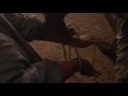 a gang of drug dealers robs and murders a house full of people. one of the most disturbing stabbing scenes on film