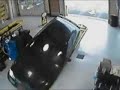 female driver entering car repair service
