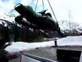 heli sled parking onto pickup High Prairie, Alberta