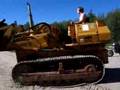 Unloading Komatsu D41S track loader