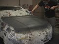 me primering the hood and trunk, most of the body work is done.