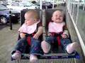 Twins laughing at Tesco