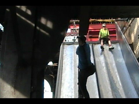 Casey falling down slide