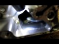www.fzrphotography.com http The owner of this 2009 Yamaha YFZ450R tried to save some money and adjust his own valves. He did not know how to correctly reset the cam chain tensioner and did some serious tensioner and chain damage. He was very lucky in two ways. First, he didn't break the cam chain and secondly, he didn't seize the engine, because all the debris from the tensioners filled the oil pump pickup screen.
