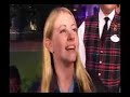 she's in front of the haunted mansion in disneyland in anaheim, talking about the haunted mansion. go figure.