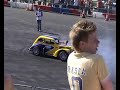 terry grant changing a wheel on his car whilest donutting! at santa pod ultimate street car 2007
