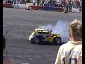terry grant changing a wheel on his car whilest donutting! at santa pod ultimate street car 2007