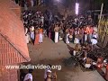 Coconut breaking ritual at Vettakkorumakan Temple Kannur