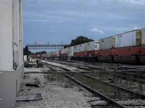 BNSF #4487 Leads Stacktrain, Amtrak ...