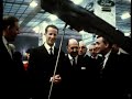 The unveiling of the new Ford Capri at the 1969 Brussels Motor Show,plus a brief clip of Colin Chapman inspecting the production line of the Lotus Cortina