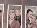 please visit my card museum by clicking the blue creamofcardstv link above and the link on the left-hand-side of my profile page.

this video clip features the following set of cards:
http://stores.ebay.com/creamofcards-cigarette-cards#bottom


manufacturer: a & m wix 
series title: film favourites, 3rd series 
year of issue: 1939  card size: normal 
complete set: yes 
number of cards offered: 100 cards 

includes:

marie wilson,johnny davis,virginia field,douglas fairbanks junior,virginia grey,mickey rooney,rochelle hudson,robert kent,loraine day,tom brown,sara haden,minor watson,heather angel,john howard,laraine day,alan curtis,lynne carver,lew ayres,joan crawford,, jane bryan,james cagney,rochelle hudson,gordon oliver,joan blondell,pat o'brien,priscilla lane,dick powell,margaret lindsay,john payne,joan crawford,robert young,olivia de havilland,john payne,barbara o'neil,thomas mitchell,myrna loy,robert taylor,, rosemary lane,james cagney,norma shearer,tyrone power,olivia de havilland,errol flynn,merle oberon,laurence olivier,luise rainer,william powell,rosemary lane,dick foran,jeanette macdonald,clark gable,joan gardner,luis trenker,janet gaynor,robert, montgomery,elisabeth bergner,hugh sinclair,jean parker,robert donat,maureen o'sullivan,robert taylor,olivia de havilland,george brent,gale page,dick foran,margaret sullivan,randolph scott,elisabeth bergner,douglas fairbanks jnr,janet gaynor,frederic, march,helen burgess,james ellison,ann sheridan,john payne,greta garbo,robert taylor,eleanor powell,nelson eddy,gail patrick,richard dix,ann rutherford,james stewart,myrna loy,clark gable,margaret sullivan,walter pidgeon,olivia de havilland,anna neagle