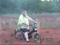 Fat kid on a moped crashes Fat kid on a moped crashes