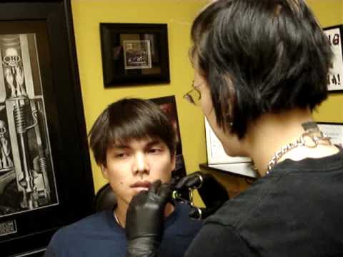 Auburn to get his lip piercing done. He was pierced by Amber Gauge. Auburn to get his lip piercing done. He was pierced by Amber Gauge.