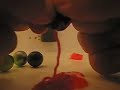 more frozen paintballs being cut open more frozen paintballs being cut open
