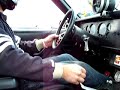 Watch Dave hammer through the gears in his 10 sec street mustang. Note the finger on the NOS button on the wheel