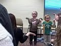 Aine singing at recital