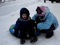 Mason sledding with cousin Haley Mason sledding with cousin Haley