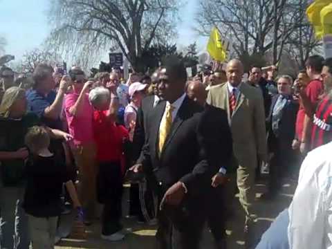 members walk through protest