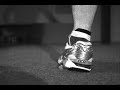 a slow motion of Asics Gel Kayano 14 hitting a stone