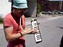 Chang playing a waltz on some... thing.