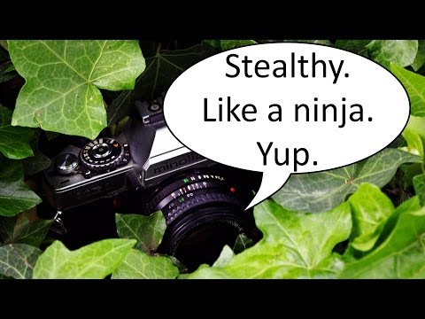 how to open a minolta xg 1 camera