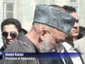 Karzai in peace pledge at Rabbani funeral