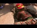 Rescuers scramble for building collapse survivors