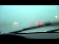 Driving into a heavy rain storm.