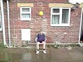 big water balloon droped out of window onto alans head in slow motion big water balloon droped out of window onto alans head in slow motion