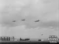 More Mosquito footage, some good quality stuff. 

The de Havilland Mosquito was a British combat aircraft that excelled in a number of roles during the Second World War. It served with the RAF and many other air forces both in the Second World War and postwar. The Mosquito was powered by a pair of Rolls-Royce Merlins with the pilot and navigator sitting side by side. In the conceptual design stage, de Havilland designers found that adding any defensive armament would significantly reduce the aircraft's maximum speed. Realising that the loss in performance was not worth the benefit, the initial bomber version was designed without any guns. The various roles of the Mosquito included: tactical bomber, pathfinder, day or night fighter, fighter-bomber, intruder, maritime strike and photo reconnaissance aircraft. 
 
The de Havilland company conceived the idea of a wooden aircraft to take advantage of the underused resources and skills of the furniture industry at a time of great pressure on the conventional aircraft industry combined with wartime shortages of steel and aluminium. The Air Ministry was initially not interested in the innovative approach; de Havilland, under chief designer Ronald Bishop, developed the Mosquito on a speculative basis. The ministry became interested when they saw the Mosquito prototype's performance. Throughout the 1930s, de Havilland had established a reputation in developing innovative high-speed aircraft such as the DH.88 Comet mailplane and DH.91 Albatross airliner that had already successfully employed the composite wood construction that the Mosquito would use.

Construction: The bulk of the Mosquito was made of plywood. Stronger and lighter than most grades of plywood, this special plywood was produced by a combination of 3/8