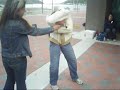Busker Dislocates Shoulder Trying To Escape Straightjacket