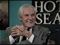 crazy talk show host tries to grill noted harvard professor timothy leary.