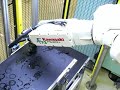 Kawasaki robot loading a Victor lathe Kawasaki robot loading a Victor lathe