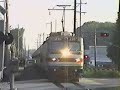 SEPTA Train 6215 out of Warminster with AEM-7 and Bombardier coaches near the old Fulmor Station south of Hatboro August 21 2001