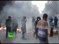 Cairo clashes video: Protesters throw stones at military police