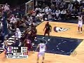 Alonzo Mourning blocks Vince Carter