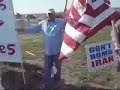 Anti-McCain/Palin signs and protesters at McCain Rally