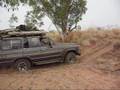 landcruiser trying to get up sandy riverbank